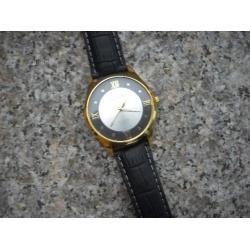 Orologio laminato oro