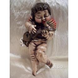 Thun putto con chitarra serie putti musici