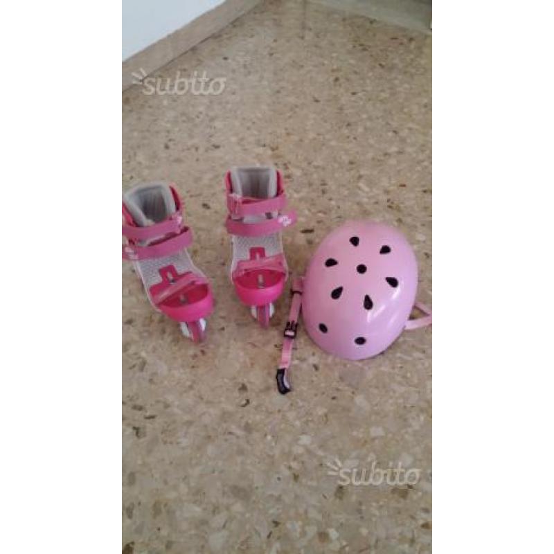 Pattini con casco per bambina